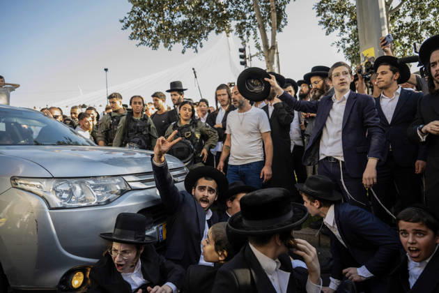 Anti-military service Ultra-Orthodox Jews block road to West Jerusalem JERUSALEM - OCTOBER 8: Ultra-Orthodox Jews, known as Haredi, protest the lack of legislation exempting yeshiva students from mandatory military service and the detention of students on grounds of draft evasion in West Jerusalem, on October 8, 2026. Haredi protesters lie on the road leading to West Jerusalem and block traffic, while Israeli police deployed to the scene intervene against the demonstrators. Mostafa Alkharouf Anadolu Jerusalem Israel. Editorial use only. Please get in touch for any other usage.  Copyright: x2026xAnadoluxMostafaxAlkharoufx