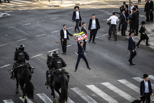 Anti-military service Ultra-Orthodox Jews block road to West Jerusalem JERUSALEM - OCTOBER 8: Mounted Israeli police officers on horseback deployed to the scene intervene against demonstrators as Ultra-Orthodox Jews, known as Haredi, protest the lack of legislation exempting yeshiva students from mandatory military service and the detention of students on grounds of draft evasion in West Jerusalem, Israel, on October 8, 2026. Haredi protesters lie on the road leading to West Jerusalem and block traffic. Mostafa Alkharouf Anadolu Jerusalem Israel. Editorial use only. Please get in touch for any other usage.  Copyright: x2026xAnadoluxMostafaxAlkharoufx