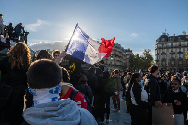 High School And University Student Protest - Paris A demonstrator waves a French flag during a high school students protest at Place de la Bastille in Paris, France on October 8, 2026. Photo by Fabrice Sapte ABACAPRESS.COM Paris France Copyright: xSaptexFabrice ABACAx