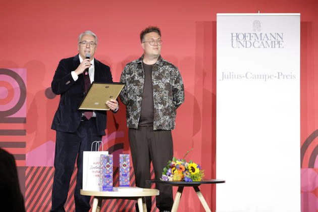 Frankfurt Impressions 09 10 2026 At the 78th Frankfurt Book Fair in 2026, the Julius Campe Prize—99 bottles of wine—will be awarded to Thomas Sachsenmeier (wearing a brown shirt, on the left). Tim Jung, publishing director at Hoffmann und Campe, Frankfurt am Main, Hesse, Germany