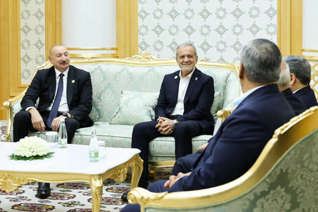 October 9, 2026, Turkmenbashi, Turkmenistan: Azerbaijani President Ilham Aliyev, left, and Iranian President Masoud Pezeshkian sit facing members of their delegations during a bilateral meeting in Turkmenbashi, Turkmenistan, on October 9, 2026. According to Azerbaijan s presidency, the leaders reviewed recent bilateral contacts and a recent visit by an Azerbaijani delegation to Iran, said work on the Aghband-Kalaleh project had reached its final stage and discussed follow-up on agreements from their previous meeting in Bishkek. Aliyev also noted Iran s first participation as a non-member state in the CIS Plus format. Turkmenbashi Turkmenistan - ZUMAi98_ 20261009_zih_i98_093 Copyright: xIranianxPresidencyx