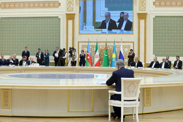 October 9, 2026, Turkmenbashi, Turkmenistan: Russian President Vladimir Putin sits at the summit table during the Caspian Environmental Summit in the Avaza National Tourist Zone in Turkmenbashi, Turkmenistan, on October 9, 2026. The first Caspian Environmental Summit, chaired by Turkmen President Serdar Berdimuhamedov, brought together the presidents of Azerbaijan, Iran, Kazakhstan and Russia. The leaders adopted a joint decision aimed at strengthening five-party cooperation on falling Caspian Sea levels, while Pezeshkian called for joint scientific research, data sharing, coordinated action and stronger implementation of the Tehran Convention. Turkmenbashi Turkmenistan - ZUMAi98_ 20261009_zih_i98_077 Copyright: xIranianxPresidencyx