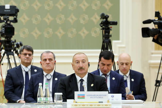 October 9, 2026, Turkmenbashi, Turkmenistan: Azerbaijani President Ilham Aliyev sits behind Azerbaijan s nameplate during the Caspian Environmental Summit in the Avaza National Tourist Zone in Turkmenbashi, Turkmenistan, on October 9, 2026. The first Caspian Environmental Summit, chaired by Turkmen President Serdar Berdimuhamedov, brought together the presidents of Azerbaijan, Iran, Kazakhstan and Russia. The leaders adopted a joint decision aimed at strengthening five-party cooperation on falling Caspian Sea levels, while Pezeshkian called for joint scientific research, data sharing, coordinated action and stronger implementation of the Tehran Convention. Turkmenbashi Turkmenistan - ZUMAi98_ 20261009_zih_i98_039 Copyright: xIranianxPresidencyx