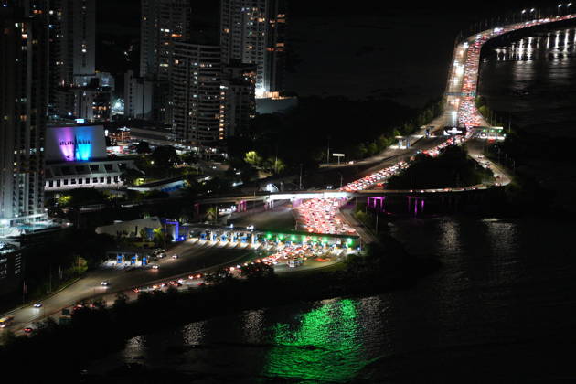 (261010) -- PANAMA CITY, Oct. 10, 2026 -- Heavy traffic is seen after a strong earthquake in Panama City, capital of Panama, Oct. 9, 2026. A powerful earthquake and a series of strong aftershocks rattled Panama on Friday, sending residents into the streets, disrupting water supplies and briefly halting flights as the government mobilized emergency personnel and resources. The University of Panama s Institute of Geosciences measured the initial quake at magnitude 7.2. It struck at 12:56 p.m. local time (1756 GMT) at a depth of 4 kilometers. By 5:30 p.m. local time, more than 40 earthquakes had been recorded, including over a dozen with magnitudes above 5.0. A quake at 3:25 p.m. had a magnitude of 6.9. ) PANAMA-EARTHQUAKE-AFTERMATH LixJiax 