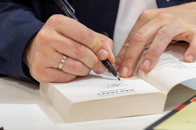 Sebastian Fitzek at the Frankfurt Book Fair, October 9, 2026. German bestselling author and thriller writer Sebastian Fitzek at a book-signing event at the 2026 Frankfurt Book Fair. At the booth of his publisher, Droemer Knau