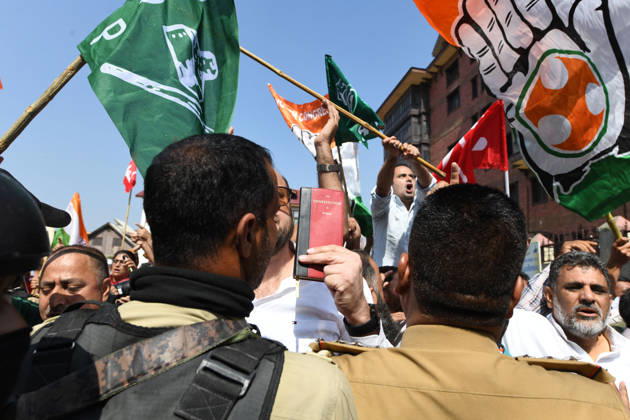 October 10, 2026, Srinagar, Jammu And Kashmir, India: Police personnel try to stop supporters of the opposition alliance INDIA bloc (Indian National Developmental Inclusive Alliance) during a protest demanding the resignation of India s Chief Election Commissioner Gyanesh Kumar over alleged voter roll irregularities linked to the special intensive revision (SIR), in Srinagar on October 10, 2026. Srinagar India  - ZUMAz120 20261010_zip_z120_016 Copyright: xBasitxZargarx