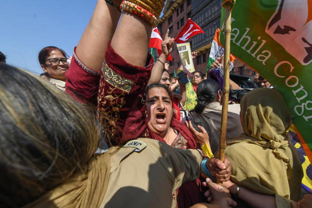 October 10, 2026, Srinagar, Jammu And Kashmir, India: Police personnel try to stop supporters of the opposition alliance INDIA bloc (Indian National Developmental Inclusive Alliance) during a protest demanding the resignation of India s Chief Election Commissioner Gyanesh Kumar over alleged voter roll irregularities linked to the special intensive revision (SIR), in Srinagar on October 10, 2026. Srinagar India  - ZUMAz120 20261010_zip_z120_018 Copyright: xBasitxZargarx