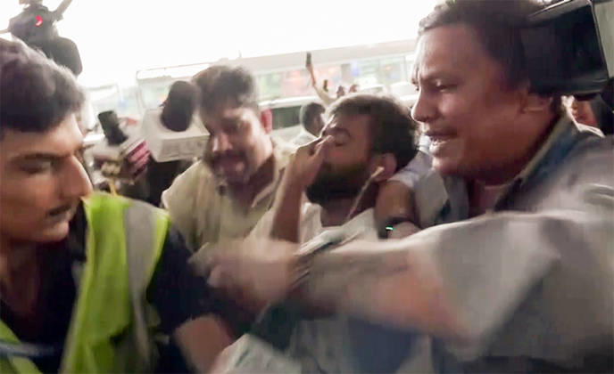 RECORD DATE NOT STATED CJP Founder Abhijeet Dipke detain by the Police at Delhi Airport New Delhi, Oct 10 (ANI): Cockroach Janta Party (CJP) Founder Abhijeet Dipke detain by the Police after the flight landed at IGI Airport, in New Delhi on Saturday. (ANI Video Grab) Delhi New Delhi India Copyright: xANIx ANI_20261010007