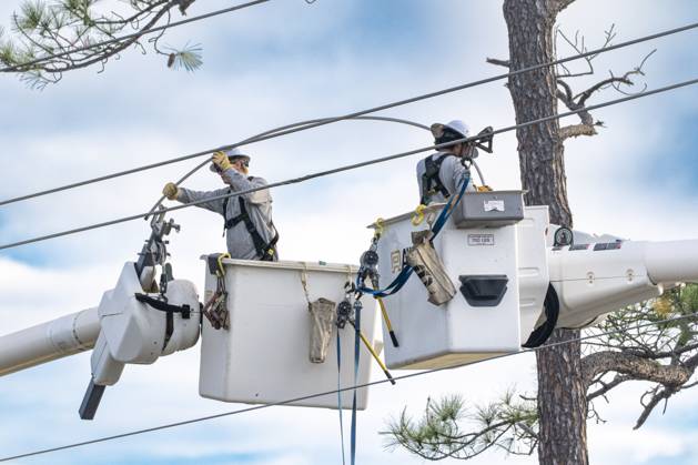 October 10, 2026, Orange Beach, Al, USA: Crews work to repair power lines after a tree fell on them as Hurricane Isaias came ashore..Hurricane Isaias made landfall Friday, October 9 along the U.S. Gulf coast. Orange Beach USA - ZUMAs197 20261010_aaa_s197_002 Copyright: xJenxGolbeckx