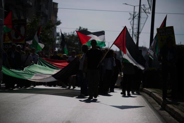 October 10, 2026, Athens, Attica, GREECE: Demonstrators carrying Palestinian flags and a large Palestinian flag-shaped banner march along a city street. Athens GREECE  - ZUMAx103 20261010_zip_x103_019 Copyright: xHarrisxXanthopoulosx