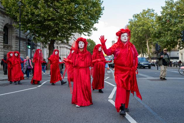 October 10, 2026, London, United Kingdom: Performers from Extinction Rebellion s Red Rebel Brigade stage a silent Walk of Shame procession during the National March for Palestine in London. The National March marks three years since the outbreak of the war in Gaza in October 2023.The National March for Palestine, which was organised by the Palestine Coalition in London. The march marks three years since the outbreak of the war in Gaza in October 2023 London United Kingdom - ZUMAs197 20261010_aaa_s197_066 Copyright: xPhilxLewisx