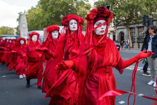 October 10, 2026, London, United Kingdom: Performers from Extinction Rebellion s Red Rebel Brigade stage a silent Walk of Shame procession during the National March for Palestine in London. The National March marks three years since the outbreak of the war in Gaza in October 2023.The National March for Palestine, which was organised by the Palestine Coalition in London. The march marks three years since the outbreak of the war in Gaza in October 2023 London United Kingdom - ZUMAs197 20261010_aaa_s197_063 Copyright: xPhilxLewisx