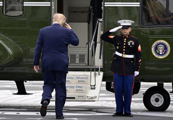 United States President Donald J Trump salutes the Marine Guard as he departs the South Lawn of the White House in Washington, DC, en route Clarksville, Tennessee on Saturday, October 10, 2026. The President will participate in a campaign rally for Tennessee Republican candidates on the ballot in November.  WAX20261010202 RONxSACHS