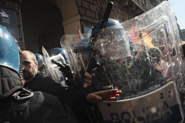 October 10, 2026, Turin, IT: TURIN, ITALY, OCTOBER 10, 2026: Thousands of pro-Palestinian demonstrators march through Turin during a protest organized by the Torino per Gaza coalition. Tensions erupted near Piazza Castello when police blocked access to the square, leading to clashes between demonstrators and riot police before some protesters were allowed to enter. Participants carried Palestinian flags and displayed effigies of Israeli Prime Minister Benjamin Netanyahu and US President Donald Trump as they marched through the city in support of Palestine. Turin IT  - ZUMAq101 20261010_zna_q101_274 Copyright: xJulianxNelajx