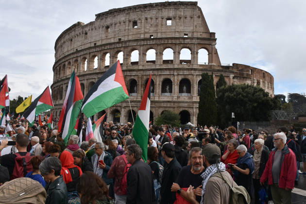 Thousands rally across Italy in support of Palestine ROME, ITALY - OCTOBER 10: Thousands of demonstrators take to the streets to show solidarity with Palestinians and call for an end to the war in Gaza, on October 10, 2026, in Rome, Italy. Demonstrators carrying Palestinian flags march from the Colosseum to Sapienza University despite rainy weather, holding a banner. Baris Seckin Anadolu Rome Italy. Editorial use only. Please get in touch for any other usage.  Copyright: x2026xAnadoluxBarisxSeckinx