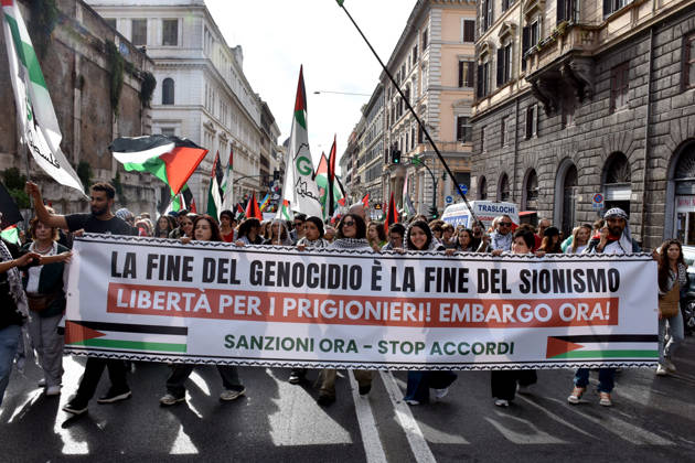 Thousands rally across Italy in support of Palestine ROME, ITALY - OCTOBER 10: Thousands of demonstrators take to the streets to show solidarity with Palestinians and call for an end to the war in Gaza, on October 10, 2026, in Rome, Italy. Demonstrators carrying Palestinian flags march from the Colosseum to Sapienza University despite rainy weather, holding a banner. Baris Seckin Anadolu Rome Italy. Editorial use only. Please get in touch for any other usage.  Copyright: x2026xAnadoluxBarisxSeckinx