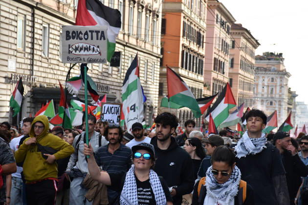 Thousands rally across Italy in support of Palestine ROME, ITALY - OCTOBER 10: Thousands of demonstrators take to the streets to show solidarity with Palestinians and call for an end to the war in Gaza, on October 10, 2026, in Rome, Italy. Demonstrators carrying Palestinian flags march from the Colosseum to Sapienza University despite rainy weather, holding a banner. Baris Seckin Anadolu Rome Italy. Editorial use only. Please get in touch for any other usage.  Copyright: x2026xAnadoluxBarisxSeckinx