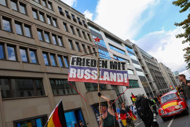 October 10, 2026, Berlin, Berlin, Germany: Demonstrators gather in Berlin for the Project M1llion rally against the German government. Participants take to the streets to voice their opposition to government policies, displaying banners and expressing their political demands. The demonstration brings together people seeking to make their concerns heard and draw public attention to their criticism of the country s political leadership. Berlin Germany  - ZUMAc291 20261010_zip_c291_008 Copyright: xMariaxCastrox