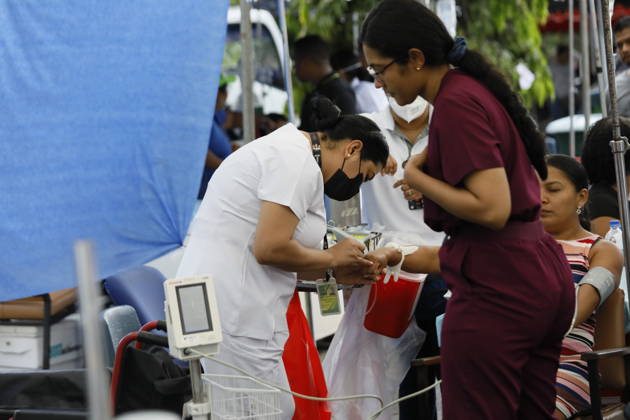 (261010) -- PENONOME, Oct. 10, 2026 -- Patients receive treatment at a temporary shelter after being evacuated from a damaged hospital in Penonome, Panama, Oct. 10, 2026. Panama declared a state of emergency on Saturday to coordinate relief efforts and assist communities affected by a powerful earthquake that struck the country Friday. (Photo by Xinhua) PANAMA-PENONOME-EARTHQUAKE-AFTERMATH DanielxGonzalez 