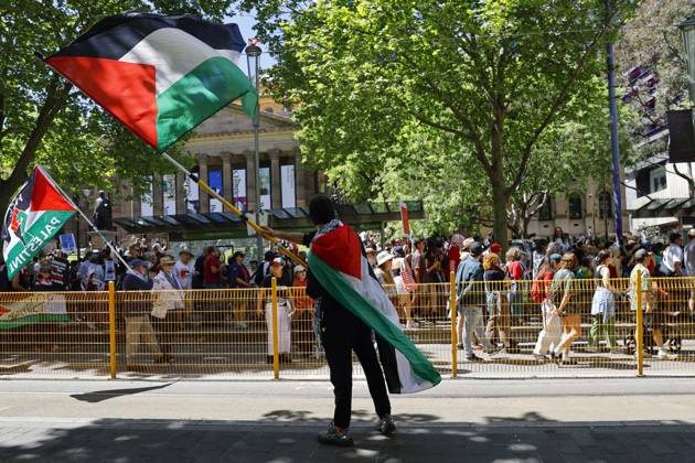 October 11, 2026, Melbourne, Victoria State, Australia: A protester waves a Palestinian flag during the rally..Pro-Palestinian demonstrators marched through Melbourne to mark three years since the outbreak of the Gaza war following the Hamas-led attacks on Israel on 7 October 2023 and Israelâ€⠢s subsequent military campaign in Gaza. Protesters called for Palestinian rights and an end to the violence in Gaza. Melbourne Australia - ZUMAs197 20261011_aaa_s197_030 Copyright: xYexMyoxKhantx