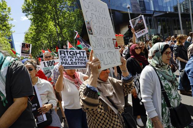 October 11, 2026, Melbourne, Victoria State, Australia: Protesters hold placards during the rally..Pro-Palestinian demonstrators marched through Melbourne to mark three years since the outbreak of the Gaza war following the Hamas-led attacks on Israel on 7 October 2023 and Israelâ€⠢s subsequent military campaign in Gaza. Protesters called for Palestinian rights and an end to the violence in Gaza. Melbourne Australia - ZUMAs197 20261011_aaa_s197_031 Copyright: xYexMyoxKhantx