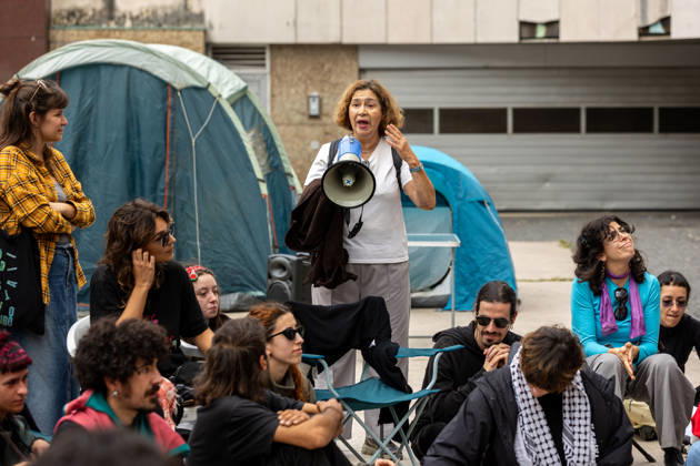 October 11, 2026, Porto, Portugal: Participants have a public assembly beside a temporary encampment in Praca D. Joao I during an overnight occupation organized by the Nao Da Mais Para Viver Assim movement following demonstrations against the housing crisis and rising living costs. Porto Portugal - ZUMAs197 20261011_aaa_s197_042 Copyright: xDiogoxBaptistax