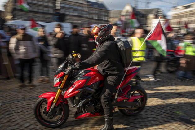 October 11, 2026, Amsterdam, North Holland, The Netherlands - Holland: 11 October 2026, Amsterdam, the Netherlands: The group Bikers for Palestine departs from Dam Square. Protesters gathered at Dam Square for speeches and anti-war music before marching through AmsterdamÃ¢â‚¬â ¢s city centre in a demonstration dubbed Ã¢â‚¬oeThree Years of GenocideÃ¢â‚¬Â. The event marked three years since the start of the IsraelÃ¢â‚¬Hamas war. Demonstrators carried Palestinian flags and banners, demanding the Dutch government act against what they describe as a genocide in Gaza. Amsterdam The Netherlands - Holland - ZUMAp202 20261011_zip_p202_003 Copyright: xJamesxPetermeierx