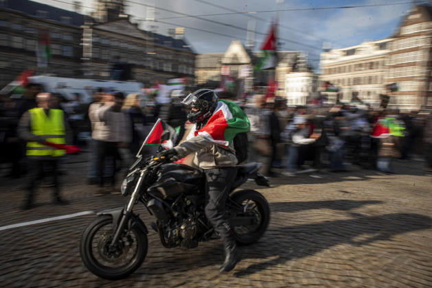 October 11, 2026, Amsterdam, North Holland, The Netherlands - Holland: 11 October 2026, Amsterdam, the Netherlands: The group Bikers for Palestine departs from Dam Square. Protesters gathered at Dam Square for speeches and anti-war music before marching through AmsterdamÃ¢â‚¬â ¢s city centre in a demonstration dubbed Ã¢â‚¬oeThree Years of GenocideÃ¢â‚¬Â. The event marked three years since the start of the IsraelÃ¢â‚¬Hamas war. Demonstrators carried Palestinian flags and banners, demanding the Dutch government act against what they describe as a genocide in Gaza. Amsterdam The Netherlands - Holland - ZUMAp202 20261011_zip_p202_032 Copyright: xJamesxPetermeierx