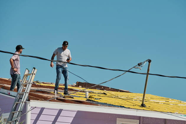 October 11, 2026, Pensacola Beach, Florida, U.S: October 11, 2026 Pensacola Beach, Florida USA: Contractors get on the roof to inspect itÃ¢â‚¬â ¢s damage after the arrival of Hurricane Isaias. Pensacola Beach U.S - ZUMAa14_ 20261011_zaf_a14_020 Copyright: xDanxAndersonx