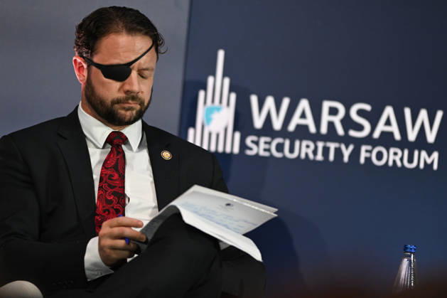 Warsaw Security Forum 2026 - Day 1 WARSAW, POLAND - OCTOBER 12: United States Representative and Member of the House Permanent Select Committee on Intelligence Dan Crenshaw speaks during a session titled American Foreign Policy: Lessons from Decades of War and Diplomacy on Day 1 of the Warsaw Security Forum 2026 (WSF2026) in Warsaw, Poland, on October 12, 2026. The conversation analyzed modern transatlantic strategy, intelligence sharing, and the evolution of global diplomatic engagement. Artur Widak Anadolu Warsaw Poland. Editorial use only. Please get in touch for any other usage.  Copyright: x2026xAnadoluxArturxWidakx