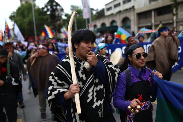 Hundreds of people protest against Columbus Day in Santiago SANTIAGO, CHILE - OCTOBER 12: Mapuche groups and other indigenous organizations are participating in the traditional protest against Columbus Day in Santiago, Chile, on October 12, 2026. Demonstrators demanded indigenous rights and territorial recognition. Lucas Aguayo Araos Anadolu Santiago Chile. Editorial use only. Please get in touch for any other usage.  Copyright: x2026xAnadoluxLucasxAguayoxAraosx