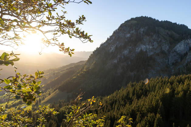 Autumn evening in the Allgäu: A view of the setting sun in the Bavarian Alps near Oberjoch, Bad Hindelang, Bavaria, Germany