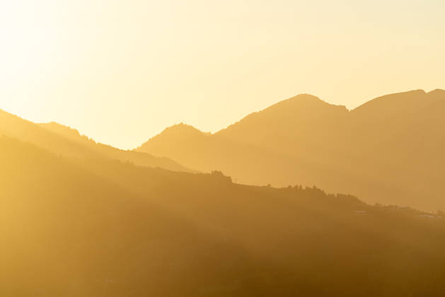 Autumn evening in the Allgäu: A view of the setting sun in the Bavarian Alps near Oberjoch, Bad Hindelang, Bavaria, Germany