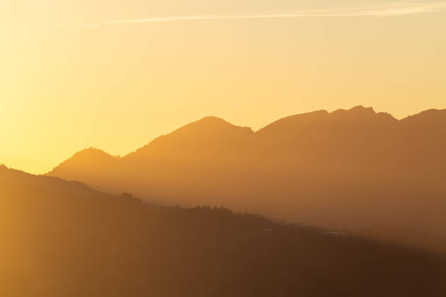 Autumn evening in the Allgäu: A view of the setting sun in the Bavarian Alps near Oberjoch, Bad Hindelang, Bavaria, Germany