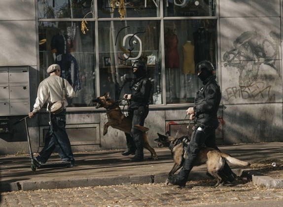 Brussels Belgium Protest Police officers with K9 units patrol a street during a protest in Brussels, Belgium on October 12, 2026. Protesters and trade union members stage demonstrations and clash with police during a nationwide public-sector strike against government austerity measures, budget cuts, and reform plans in Brussels, Belgium. Brussels Brussels Capital Belgium Copyright: xSanadxLatifax