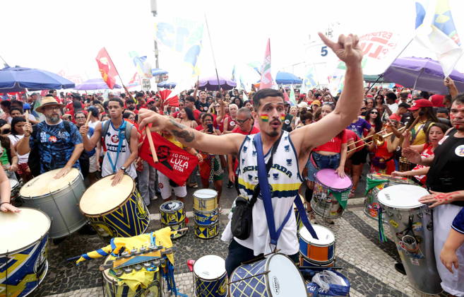 October 12, 2026, Rio De Janeiro, Rio De Janeiro, Brazil: Thousands of supporters gather in Copacabana, Rio de Janeiro, Brazil, on October 12, 2026, for a pro-democracy demonstration organized by the CENA Nacional movement, the National Union of Students (UNE) and Universibloco. Held on Brazilâ€⠢s Our Lady of Aparecida national holiday, the rally calls for the defense of constitutional rights and public policies supporting healthcare, education and social assistance. Carnival street bands, known as blocos, and percussion groups brought music and a festive atmosphere to the waterfront mobilization, blending political activism with Rioâ€⠢s popular street culture. The demonstration takes place ahead of Brazilâ€⠢s October 25 pres - ZUMAport 20261012_znp_k251_002 Copyright: xBobxKarpx