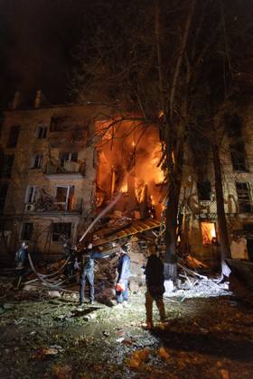 Rescue Operations After Kharkiv Strike KHARKIV, UKRAINE, OCTOBER 12, 2026: Emergency workers conduct rescue operations at a residential building damaged in a Russian strike in Kharkiv s Kholodnohirskyi district. A firefighter was injured by falling concrete debris while clearing the rubble and was evacuated on a stretcher. Kharkiv Ukraine Copyright: x xAndrewxClingx xJNAxPressx