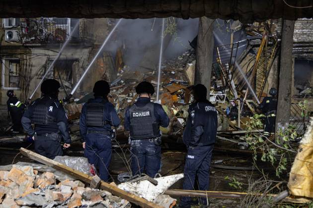 Rescue Operations After Kharkiv Strike KHARKIV, UKRAINE, OCTOBER 12, 2026: Emergency workers conduct rescue operations at a residential building damaged in a Russian strike in Kharkiv s Kholodnohirskyi district. A firefighter was injured by falling concrete debris while clearing the rubble and was evacuated on a stretcher. Kharkiv Ukraine Copyright: x xAndrewxClingx xJNAxPressx