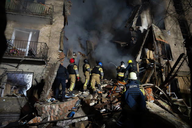 October 12, 2026, Kharkiv, Kharkiv Oblast, Ukraine: Local rescue workers and volunteers clear rubble following a Russian Missile attack on a residential area that killed multiple people in Kharkiv, Ukraine. Emergency crews search through the heavily damaged building and collapsed sections of the building for survivors and the remains of those killed in the attack. Kharkiv Ukraine  - ZUMAm350 20261012_zip_m350_013 Copyright: xCameronxJones-Manleyx