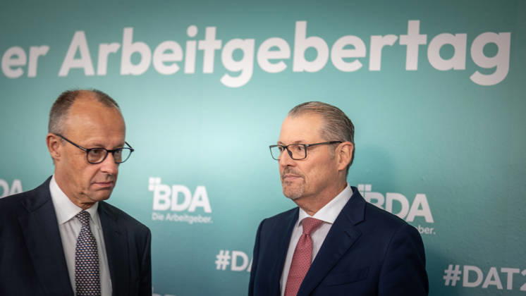 Chancellor Friedrich Merz is welcomed by Rainer Dulger, President of the Confederation of German Employers Associations (BDA), at the start of the 2026 German Employers Day, hosted by the Confederation of German Employers Associations (BDA), Berlin, Germany, at the Berlin Congress Center (bcc)