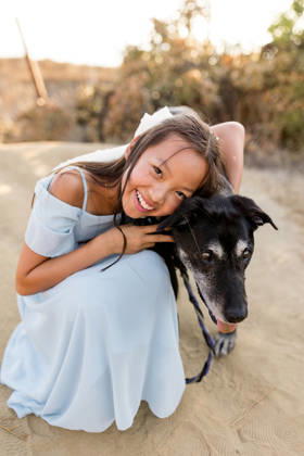 Happy young girl hugging her senior black dog outdoors San Diego, California, United States CR_JIDE261009-2128462-01 ,model released, Symbolfoto ,property released