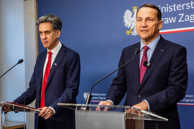 October 13, 2026, Warsaw, Mazovia, Poland: The Foreign Secretary of the United Kingdom, Ed Miliband, and Poland s Minister of Foreign Affairs, Radoslaw Sikorski, seen during the press conference..Foreign Secretary of the United Kingdom of Great Britain and Northern Ireland visits the Ministry of Foreign Affairs in Warsaw, Poland for a meeting with the Republic of Poland s Foreign Minister, Radoslaw Sikorski. During the subsequent press conference, the ministers discussed their countries ongoing cooperation in foreign policy issues, including supporting Ukraine in the war Russia is waging against it. Miliband also spoke of the ties his family has to Poland. Afterwards, the ministers travel to the second day of the Warsaw Security Forum. Wa - ZUMAs197 20261013_aaa_s197_025 Copyright: xNeilxMiltonx