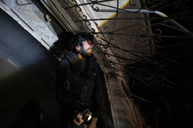 October 12, 2026, Kharkiv, Kharkiv Oblast, Ukraine: Local firefighters tackle a blaze following a Russian missile attack on a residential area in Kharkiv, Ukraine, on October 13, 2026. The strike killed multiple people and injured several others, as emergency services worked to extinguish fires and search for victims amid the rubble. Kharkiv Ukraine - ZUMAm350 20261012_zip_m350_022 Copyright: xCameronxJones-Manleyx