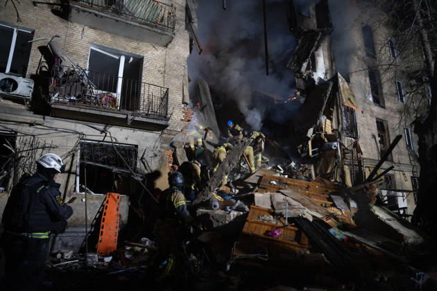 October 12, 2026, Kharkiv, Kharkiv Oblast, Ukraine: Local firefighters tackle a blaze following a Russian missile attack on a residential area in Kharkiv, Ukraine, on October 13, 2026. The strike killed multiple people and injured several others, as emergency services worked to extinguish fires and search for victims amid the rubble. Kharkiv Ukraine - ZUMAm350 20261012_zip_m350_024 Copyright: xCameronxJones-Manleyx
