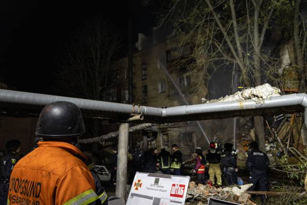 October 13, 2026, Kharkiv, Ukraine: KHARKIV, UKRAINE, OCTOBER 12, 2026: A Russian strike destroyed a section of a four-story residential building in the Kholodnohirskyi District of Kharkiv, Ukraine, on the evening of October 12. Authorities said Russian forces used Banderol-type missiles in the attack. Rescuers recovered the bodies of three people, and search operations continued. Kharkiv Ukraine - ZUMAq101 20261013_zna_q101_035 Copyright: xAndrewxClingx