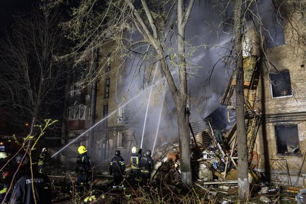 October 13, 2026, Kharkiv, Ukraine: KHARKIV, UKRAINE, OCTOBER 12, 2026: A Russian strike destroyed a section of a four-story residential building in the Kholodnohirskyi District of Kharkiv, Ukraine, on the evening of October 12. Authorities said Russian forces used Banderol-type missiles in the attack. Rescuers recovered the bodies of three people, and search operations continued. Kharkiv Ukraine - ZUMAq101 20261013_zna_q101_036 Copyright: xAndrewxClingx