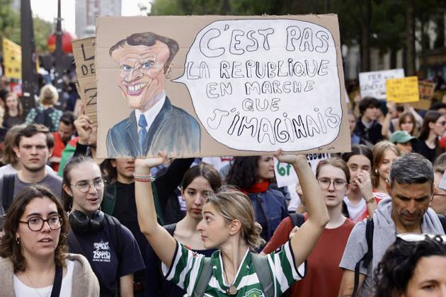 Demonstrators rally at Place d Italie in Paris amid nationwide protests across France against government policies PARIS, FRANCE - OCTOBER 13: Protesters wave union flags and hold banners during a mass demonstration at Place d Italie in Paris, France, on October 13, 2026. Trade unions, civil society organizations, and citizens took to the streets in cities across France to voice strong opposition to the government s economic reforms, proposed austerity measures, and labor policies. Ibrahim Ezzat Anadolu Ile-de-France France. Editorial use only. Please get in touch for any other usage.  Copyright: x2026xAnadoluxIbrahimxEzzatx