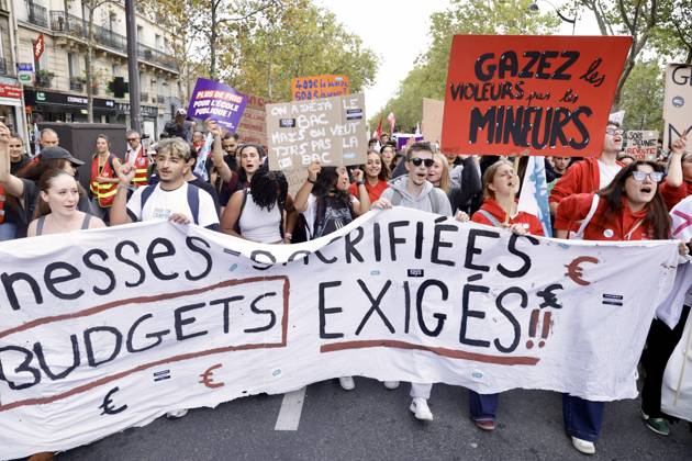 Demonstrators rally at Place d Italie in Paris amid nationwide protests across France against government policies PARIS, FRANCE - OCTOBER 13: Protesters wave union flags and hold banners during a mass demonstration at Place d Italie in Paris, France, on October 13, 2026. Trade unions, civil society organizations, and citizens took to the streets in cities across France to voice strong opposition to the government s economic reforms, proposed austerity measures, and labor policies. Ibrahim Ezzat Anadolu Ile-de-France France. Editorial use only. Please get in touch for any other usage.  Copyright: x2026xAnadoluxIbrahimxEzzatx