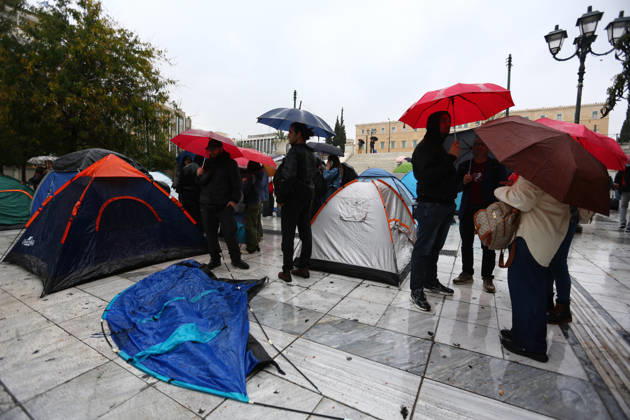 October 13, 2026, Athens, Attica, GREECE: Protesters gather among camping tents in the rain during a student demonstration demanding measures to address housing and living costs. Athens GREECE  - ZUMAx103 20261013_zip_x103_004 Copyright: xHarrisxXanthopoulosx