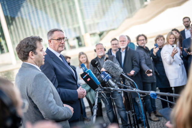 Lars Klingbeil, SPD Party Chairman and Federal Minister of Finance, and Alexander Schweitzer, Federal Minister of Labor-designate, at Friedrich-Ebert-Platz in front of the Bundestag building; introduction of the new Federal Minister of Labor on the day of his swearing-in by the SPD Party Chairman, Berlin, Germany, Friedrich-Ebert-Platz